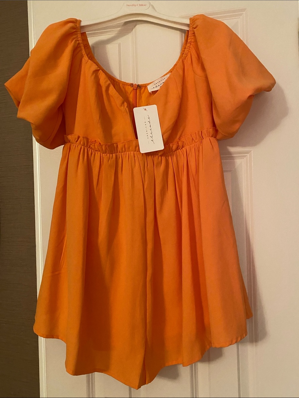 NWT Orange Puff Sleeve Romper, size M